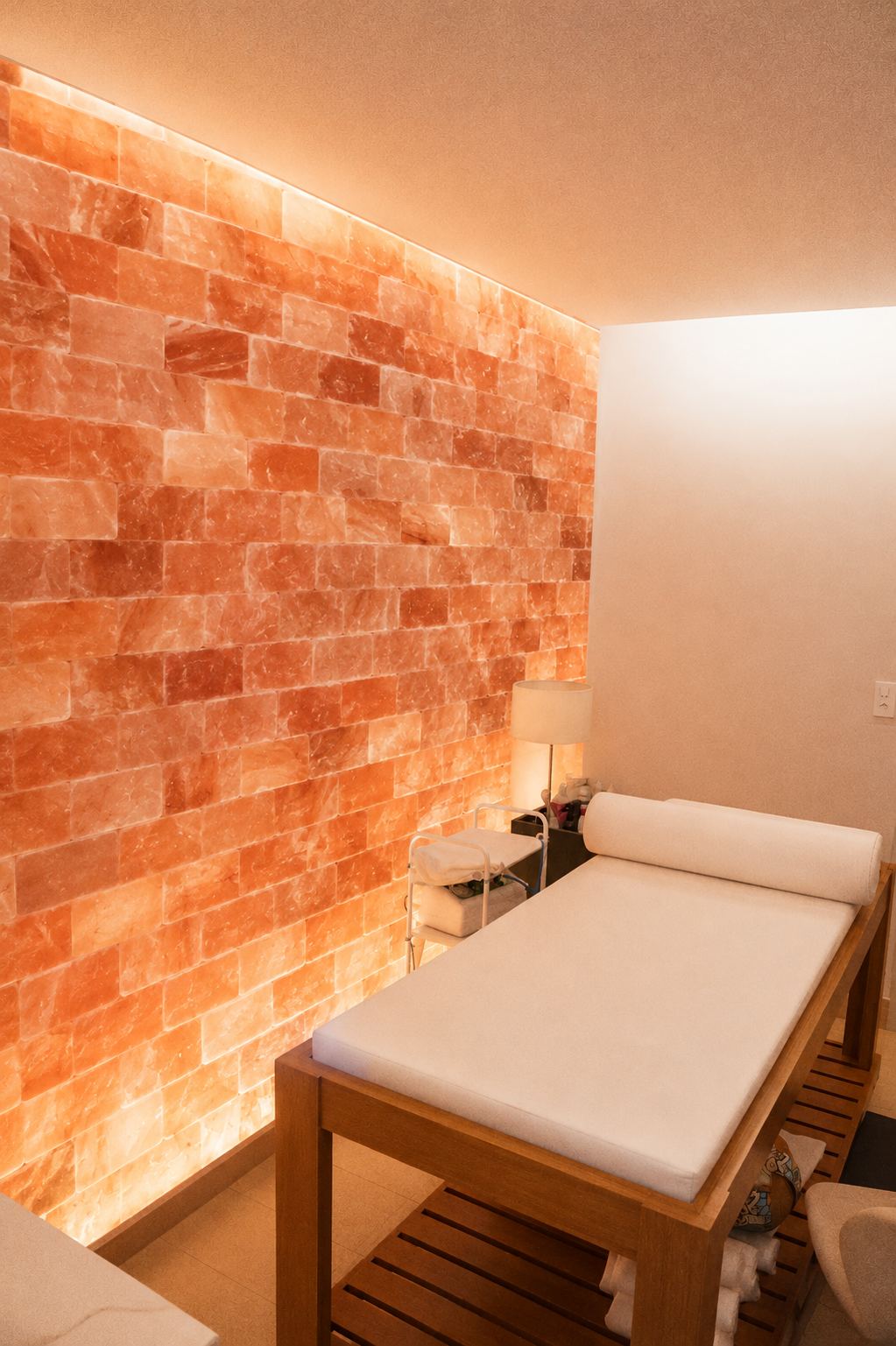 Glowing Himalayan pink salt wall in a modern interior